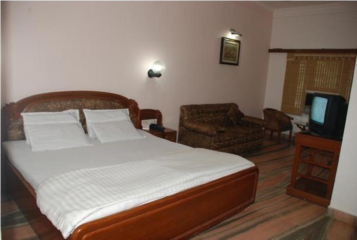 Padma Hotel Пури Стая снимка