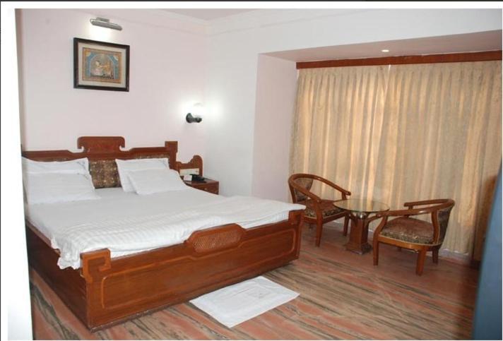 Padma Hotel Пури Стая снимка